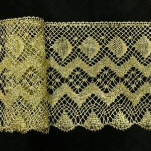 ENCAJE DORADO ANCHO CONCHAS