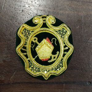 ESCUDO MACARENA ANTIFAZ VERDE